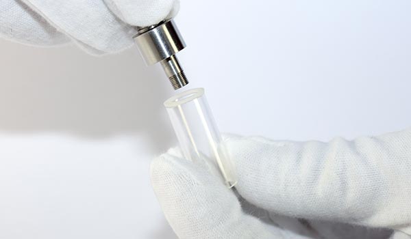 Otez le drip-tip et son support, attention au joint d'étanchéité